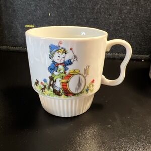 Vintage transferware Mug German boy drummer blue coat B Handle stamped Japan‎